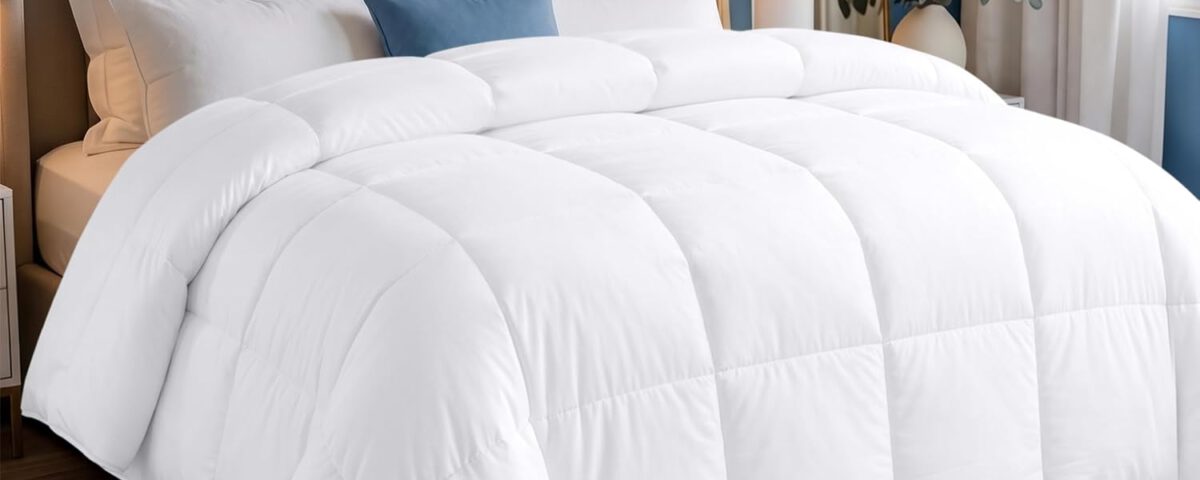 Edredón Utopia Bedding ligero 200 g/m² blanco 220x240 cm sobre una cama