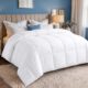 Edredón Utopia Bedding ligero 200 g/m² blanco 220x240 cm sobre una cama